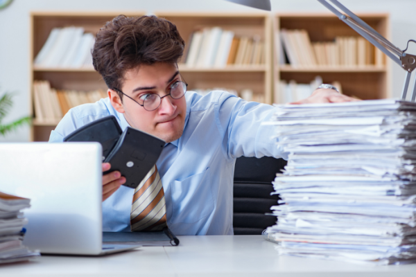 5 Clear Signs It’s Time to Hire a Bookkeeper for Your Small Business- Tall books