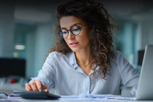 How to Choose the Right Bookkeeping Software for Your Business - Tall books