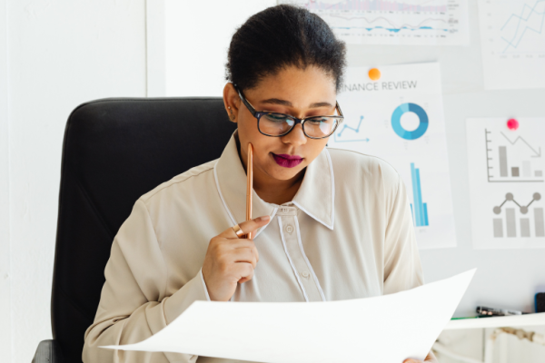 How to Read Your Financial Reports (Even If You’re Not a Numbers Person) - Tall books