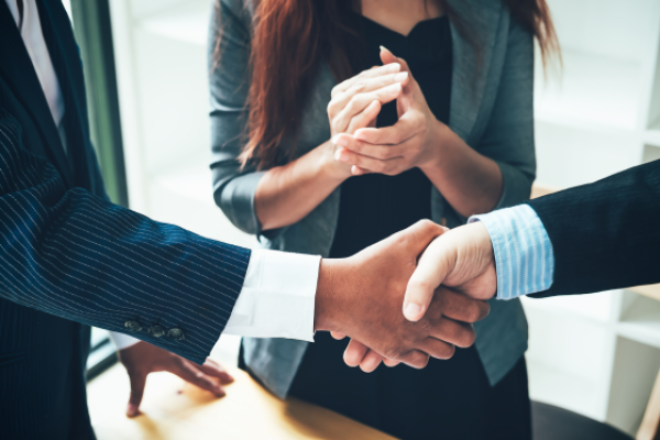 How to successfully negotiate the sale of your business - Tall books