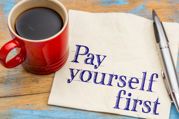 Why Treating Owner Draws Like a Salary Can Save Your Business - Tall books